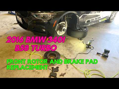 BMW 340i Front Brake Job: OEM Rotors, Pads, & 4-Piston Brembo Caliper Tips