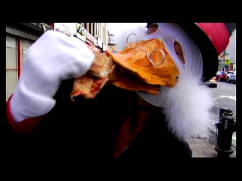 Uncle Scrooge eats a pizza