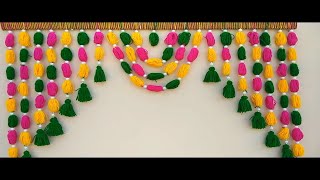A BEAUTIFUL TORAN FROM WOOLEN || DIY - HOW TO MAKE WOOLEN  DOOR HANGING TORAN AT HOME || DIY = TORAN