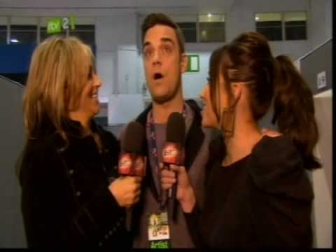 Robbie Williams backstage interview live at the brits 2010.wmv