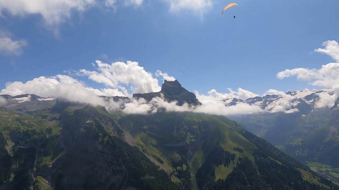 Experience the rush of tandem paragliding over Engelberg!