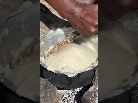 cooking most  common & appetizing  kenyan dish ( ugali)