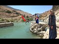 Family Trip To A Tourist Area Featuring A Tall Waterfall A Challenging Swim In The River