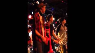 Connor plays with Big D and The Kids Table