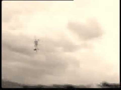 Ex President Jerry John Rawlings flying under the Adomi Bridge.