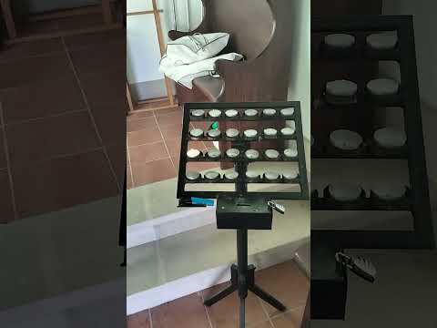 A candle burns in Capilla de Nuestra Señora del Carmen, La Vega