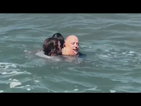 Hero surf coach speaks out after saving two lives