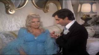 Mae West & Timothy Dalton sing "Love Will Keep Us Together"