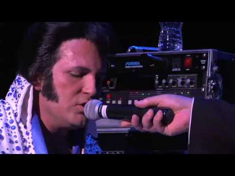 Dwight Icenhower playing the piano singing Unchained Melody