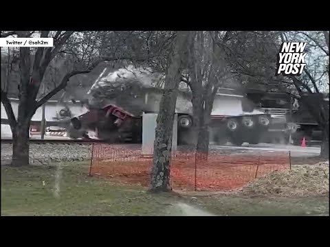 Shocking video captures train derail in Tennessee after crashing through truck | New York Post