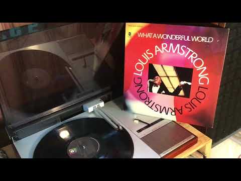 “What A Wonderful World” - Louis Armstorng