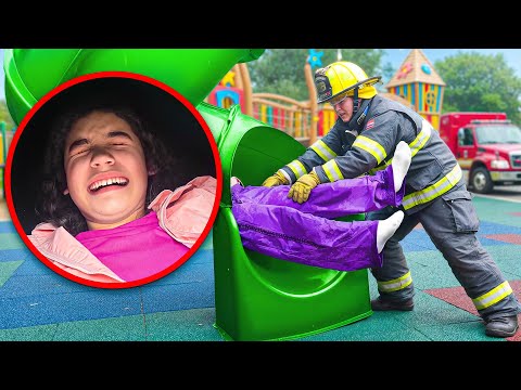 Suri Got STUCK in the Playground SLIDE She Can't Get OUT!!