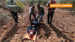 GRAPHIC CONTENT WARNING: Israeli settlers attack Palestinians, journalists in West Bank | REUTERS