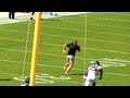 FAN RUNS ONTO FIELD RUN DOWN BY FOOTBALL PLAYER