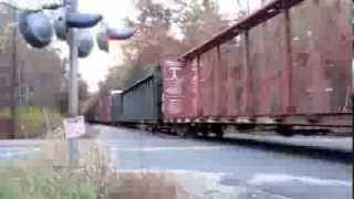 preview picture of video 'NECR and AMTRAK trains at Depot Rd, Leverett,MA'