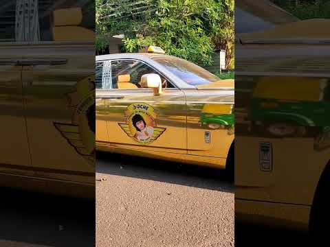 Gold wrapped Rolls Royce run as a taxi
