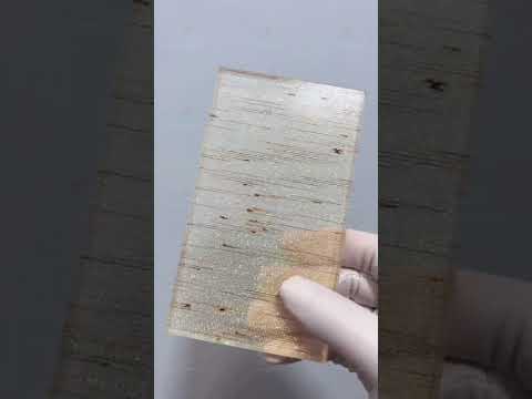 Kính ghép lụa vân gỗ ánh kim