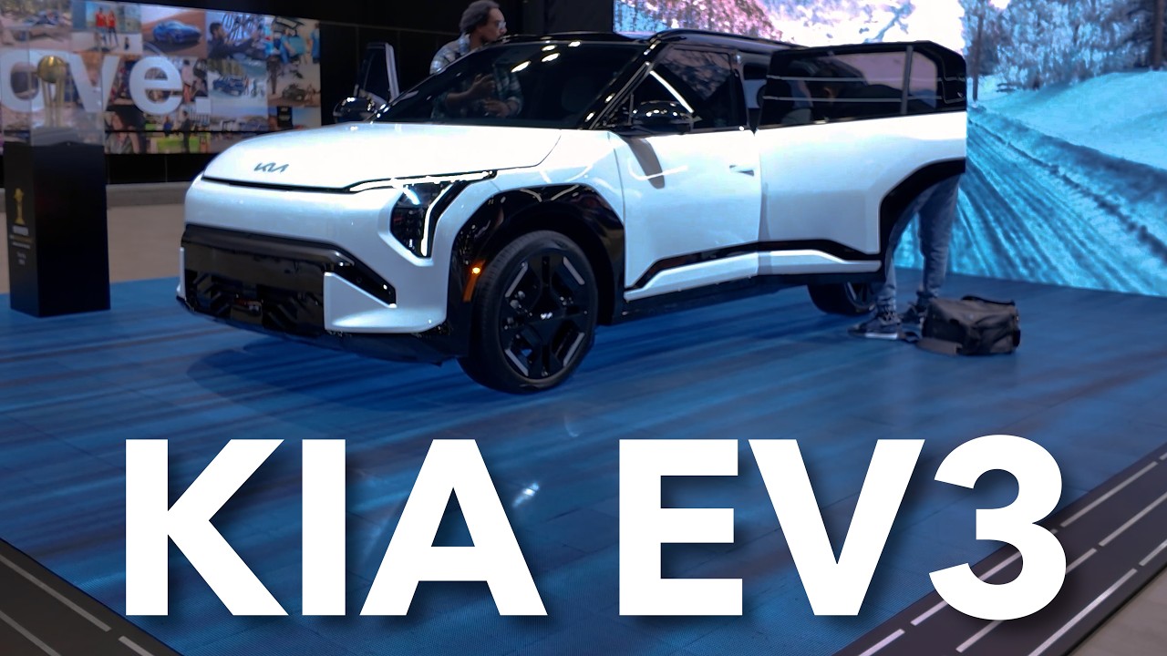 Consumer Reports reviewer examining the interior and exterior of the 2027 Kia EV3 compact electric SUV