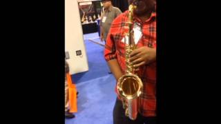 CE Winds The Sig (heavy rubber model) played by a visitor at NAMM 2014