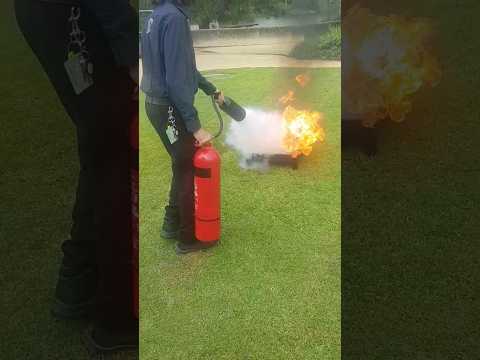 carbon dioxide fire extinguisher in use