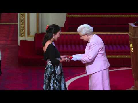 Receiving my Queen's Young Leader award from Her Majesty Queen Elizabeth II at Buckingham Palace