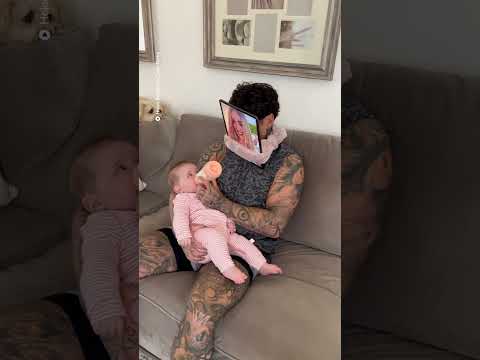 Dad outsmarts baby while feeding