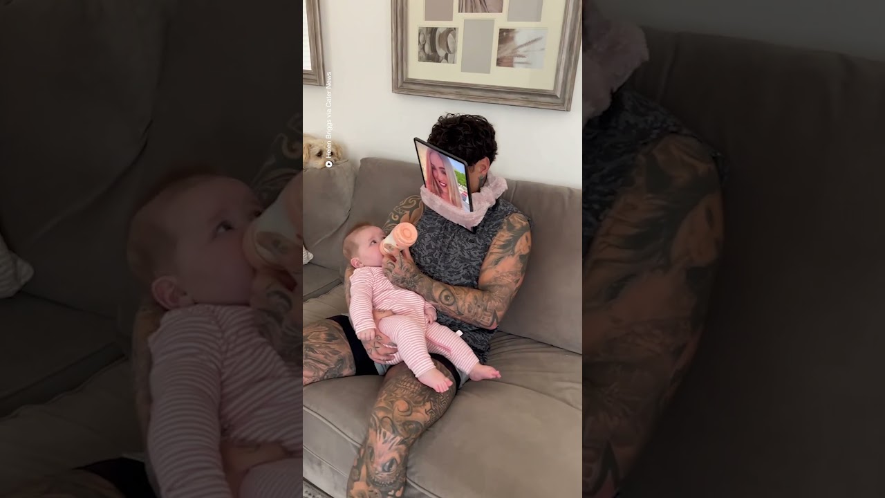 Dad outsmarts baby while feeding