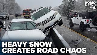 Heavy snow causes closures at Snoqualmie Pass, SR 410, SR 18