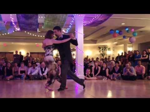  Alex Krebs  and  Hannah Poston  are  dancing  to  a  tango  at  San Diego Tango Festival  in  2013