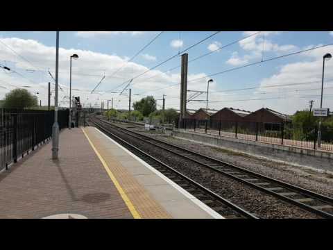 DRS 88002 TnT 68022 storms through Warrington Bank Quay on the Northern Belle