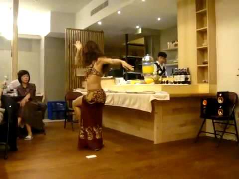 Alida Lin bellydancing in restaurant