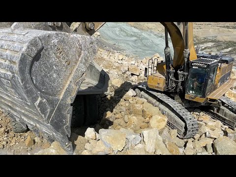 Caterpillar 390D Excavator Loading Caterpillar 775E Dumper And Trucks - Pyramis Ate