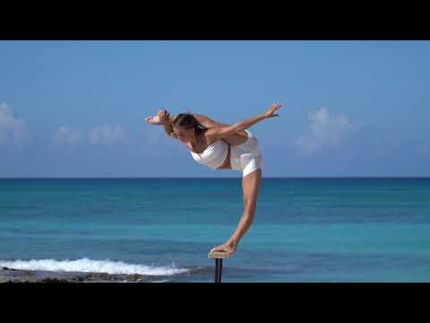 Handstand on the beach by Liliia Krylova