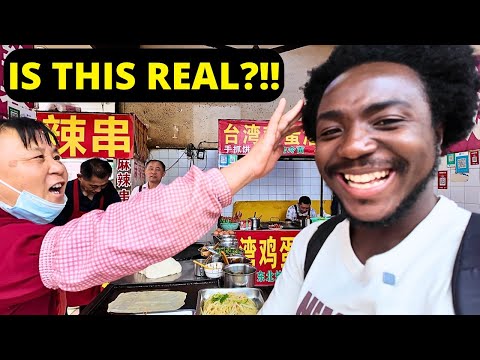 BLACKMAN SPEAKS FLUENT CHINESE IN A CHINESE VILLAGE STREET...THIS HAPPENS NEXT
