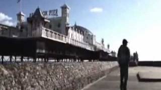 Kite surfer - Lewis Crathern - jumping two piers in England Brighton