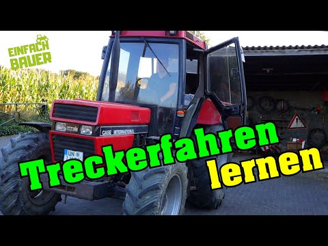 Apprentice learns to drive a tractor