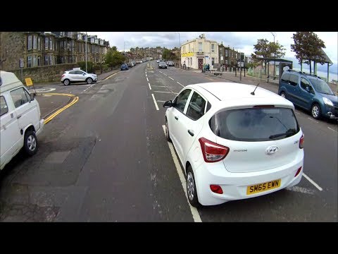 SM65EWN - MGIF of cyclist indicating right