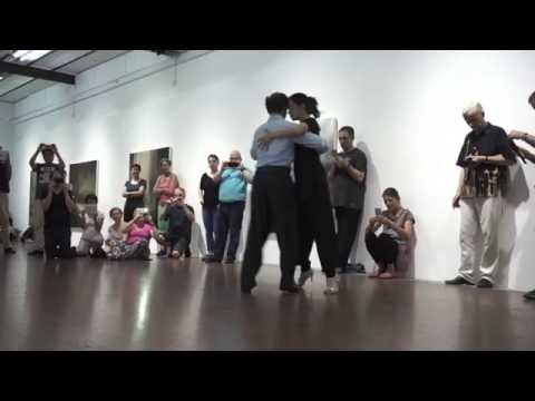  Michelle Marsidi  and  Joachim Dietiker  are  dancing  to  "  Silueta Portena  "  by  Francisco Canaro
