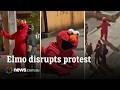 Person Dressed As Elmo Disrupts Anti ICE Protest