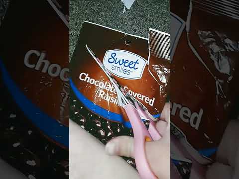 cutting chocolate covered raisins package #shorts #chocolate #raisins