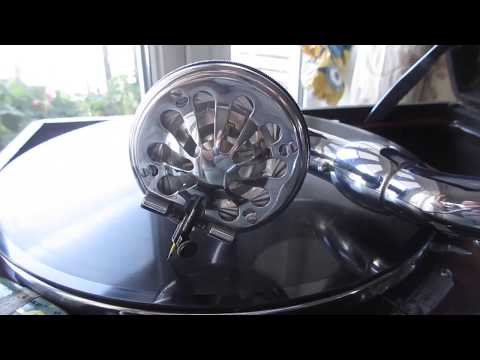 3. 1935 Black HMV 102 playing 1932 Mini the Moocher, Roy Fox 78.