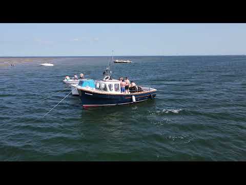 Short clip Fishermen party on the Eastern Scheldt, Yerseke 4K