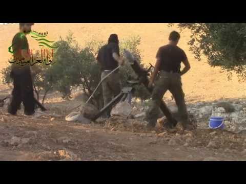 برومو يرصد المشاركات العسكرية لألوية الغر الميامين في معركة السيطرة على حاجز زلين في ريف حماة