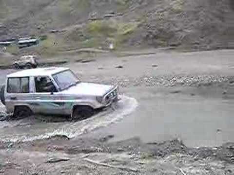 sam in the cruiser on the beach