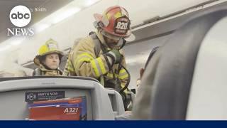 Smoking laptop aboard American Airlines flight