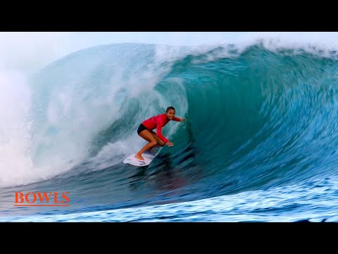 Surfing at the Ala Moana Bowl.  South Shore summer surf session.