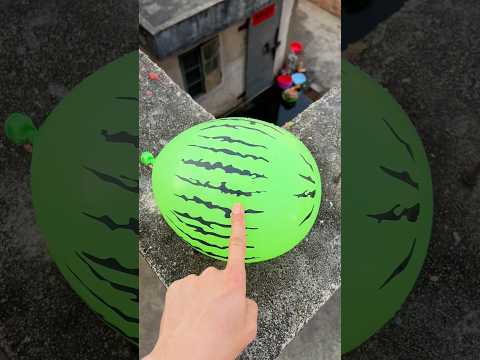 Experiment: Will a water balloon explode if it rolls down from a tall building? 💥 #balloon