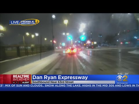 Slick Road Conditions Amid Snowfall In Chicago Area