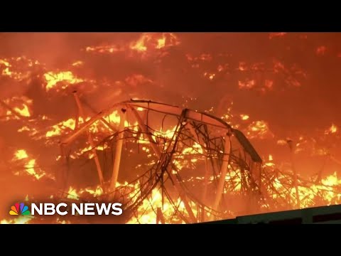 Man arrested over massive warehouse fire