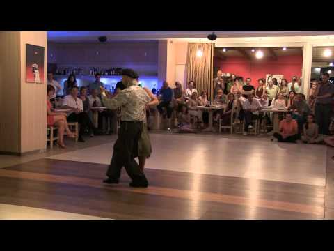  Cristina Ladas  and  Homer Ladas  are  dancing  to  the  milonga  "  Mi Vieja Linda  "  at  Sunny Tango Festival  in  2012